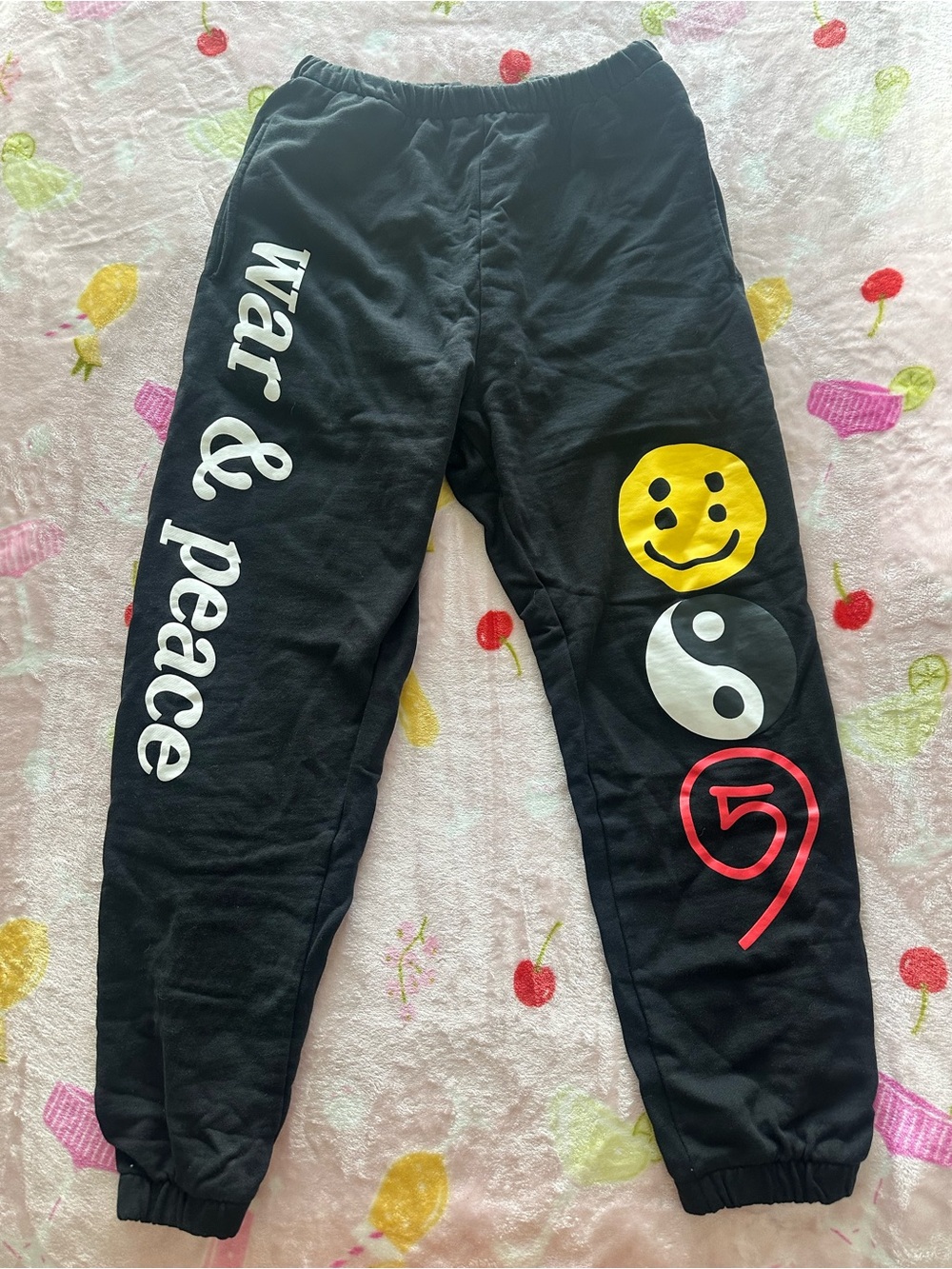 Black 'war & peace' Graphic Sweatpants with Yellow Smiley